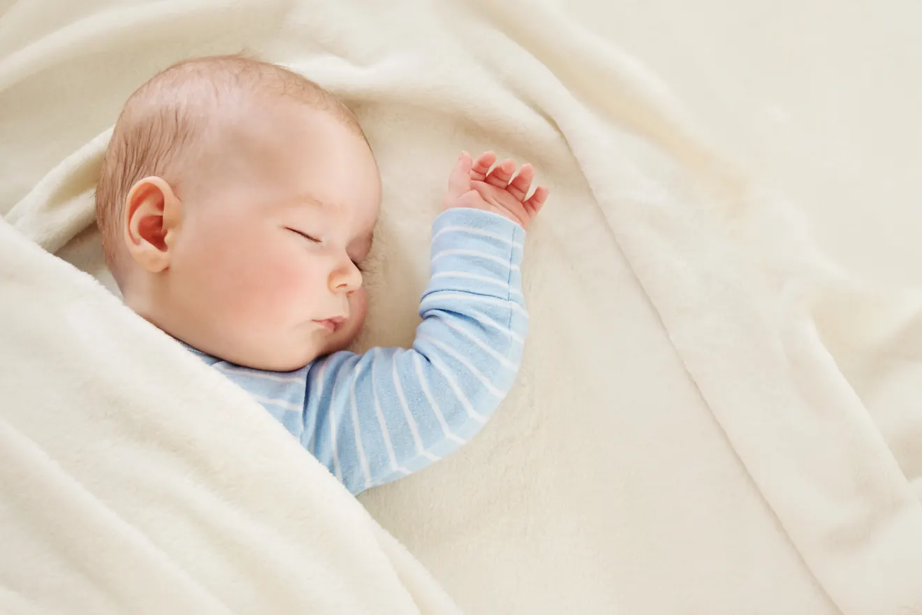 A sleeping baby — nursery audio from a real DeeLab project was segmented and labelled for an AI baby-monitor model
