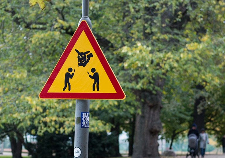 DeeLab, AR Data Labeling, An unofficial, fan-made Pokémon Go sign in Helsinki Kaisaniemi park by https://commons.wikimedia.org/wiki/User:Olimar