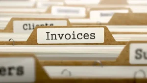 A folder of invoices among various documents. Data labeling ensures scalable and accurate invoice automation, driving innovation and continual improvement in the industry by enabling systems to handle large volumes of invoices while maintaining accuracy and performance.