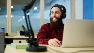 Male DeeLab audio annotator wearing headphones, labeling audio files for later use in the machine learning phase. From speech recognition and natural language processing to audio classification and sentiment analysis, we cover a wide range of audio annotation and audio labeling tasks.