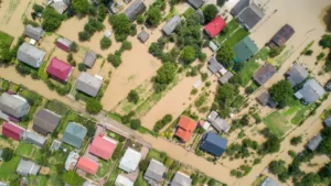 Satellite Image Labeling in Disaster Recovery and Humanitarian Aid. Aerial view of flooded houses with dirty water of Dnister river in Halych town, western Ukraine.