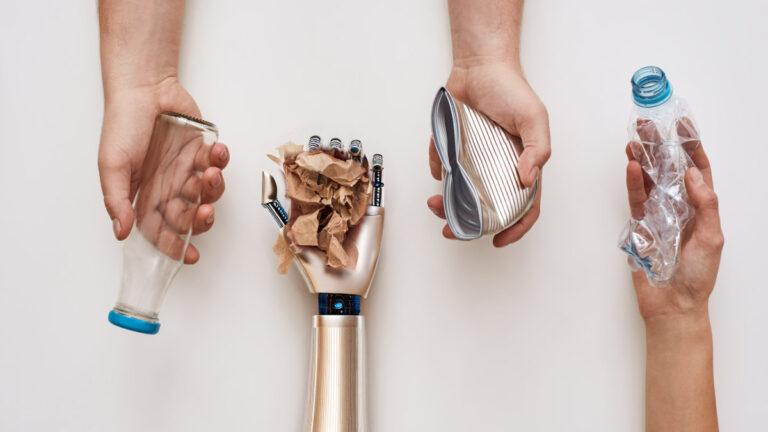 A row of hands holding different types of waste, such as plastic, paper, and metal; one hand is robotic, symbolizing the role of AI, data annotation and automation in modern waste segregation.